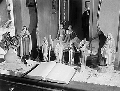 Altar in the bedroom of Mrs. Ella Watson.