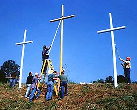 Men from Wyndale Baptist Church repairing cross site.