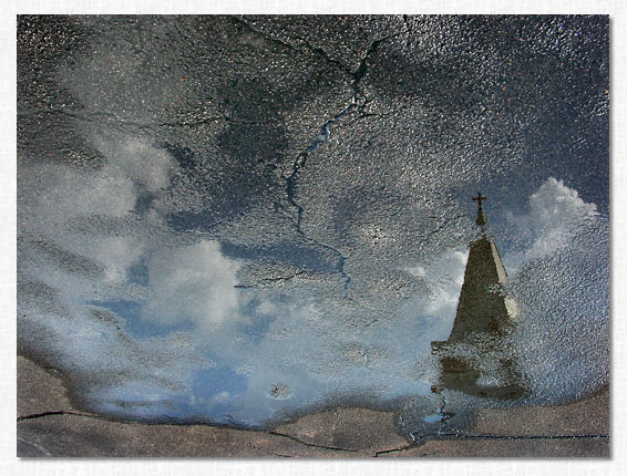 Puddle and First UMC Steeple.